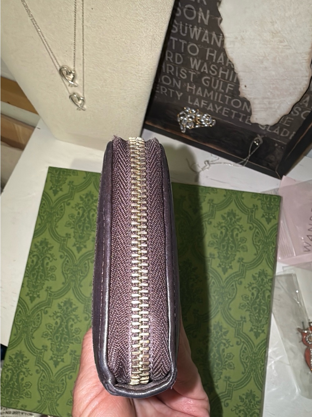 Gucci Guccissima zip-around wallet features signature embossed monogram leather - Picture 10 of 14